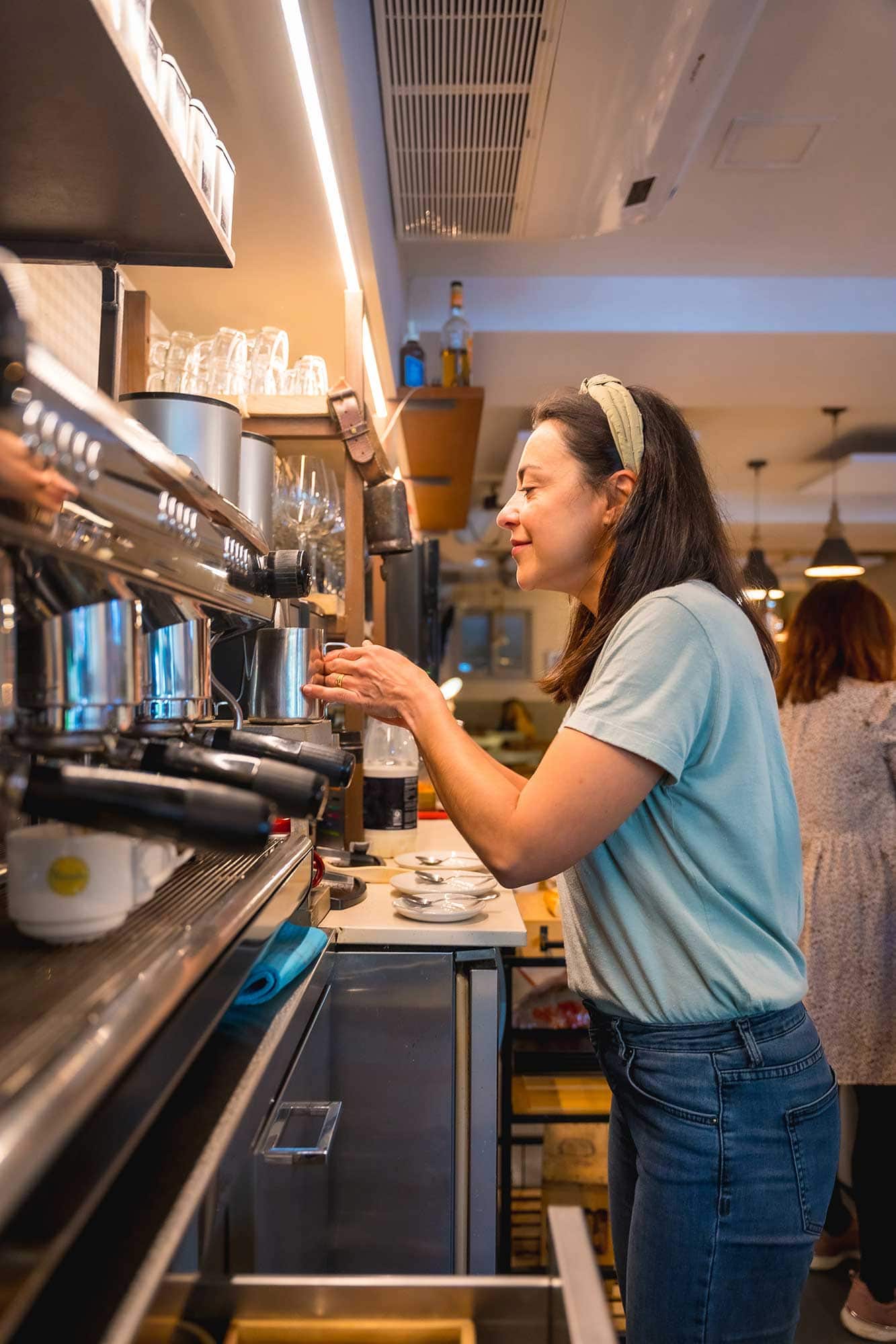 owner of the female cafeteria preparing coffee in 2024 12 10 02 32 06 utc scaled